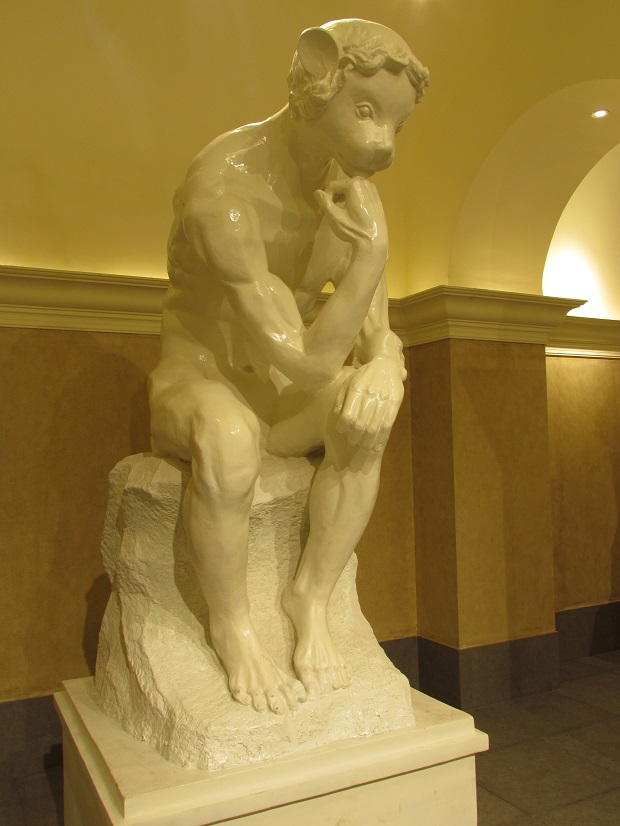 A teddy bear in a reimagining of Rodin's The Thinker. Photo / Rod Pascoe